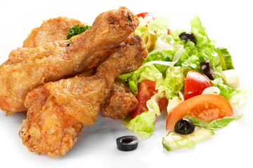 Chicken legs with fresh vegetables
