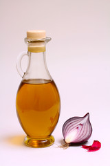 Olive oil bottle with onion