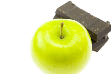 apple and chocolate isolated on white