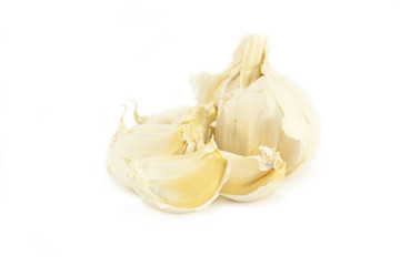 Garlic cloves on white