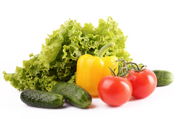 cucumber, pepper, tomatos and salad isolated on white
