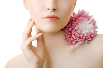Obraz na płótnie Canvas woman lips flower closeup cut on white background