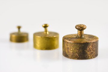 Three weights on a white background