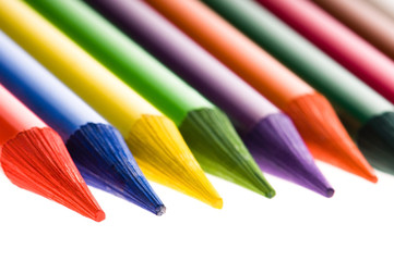 Collection of colorful pens over white background