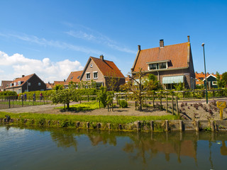 Fototapeta na wymiar Scenic Cottages in Marken, Netherlands