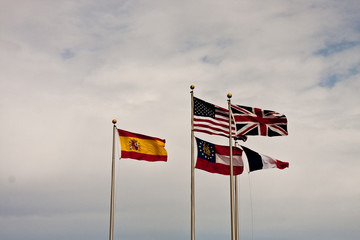 Five Flags Against Clouds