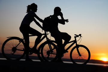 Fototapeta premium Couple on bicycles