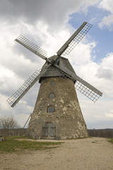 Fototapeta na wymiar Old windmill and blue sky