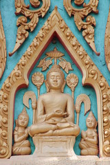 Fototapeta na wymiar buddha image on gable of temple, Kantarawichai, Mahasarakam
