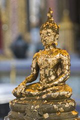Buddha Image Covered with Gold Leaves
