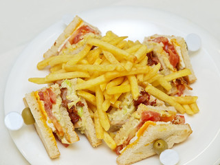 club sandwich with french fries