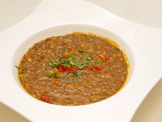 lentil soup in a white bowl