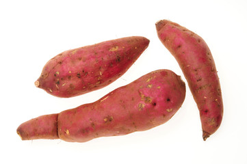 Red Sweet Potatoes On White background