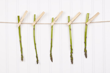 Summer Asparagus Hanging from a Clothesline