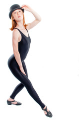 Attractive red headed jazz dancer in tights with Bowler