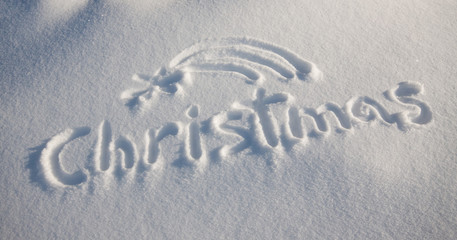 Word christmas written on snow