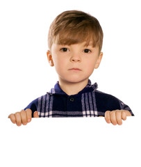 Boy holding a blank