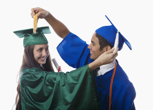 college graduates in cap and gown