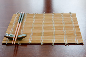 Chopsticks on mat