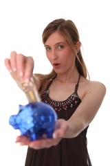 Frau mit Sparschwein