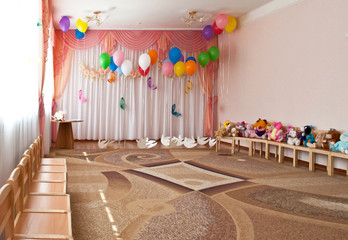decorated the room in front of a party for young children