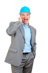 engineer with blue hard hat talking on cell phone