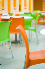 Colored chairs in the cafe