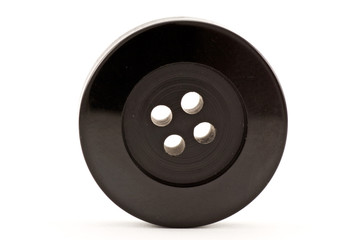 black clothes button ,isolated on white background