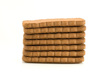 pile of brown biscuits, isolated on white background