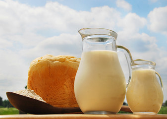 Jug with milk, bread and meal