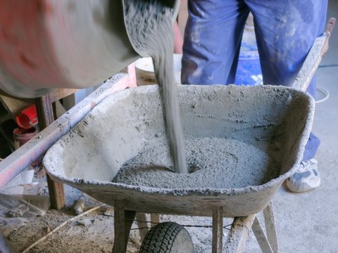 wheelbarrow and fresh cement