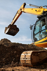 Fototapeta premium loader excavator works in a quarry