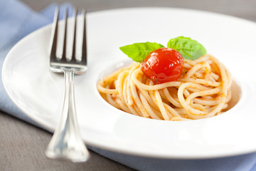 Spaghetti with cherry tomato and basil