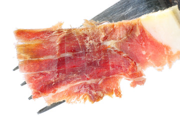 serrano ham with fork