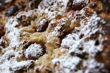 Soufflé with bread and cherries, close up