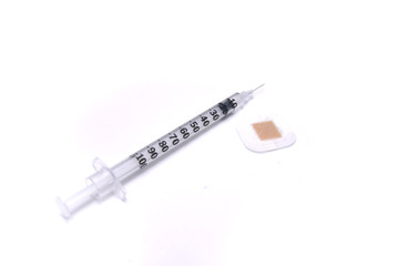 Syringe with bandage