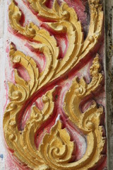 Thai art carving on pillar of temple, Wat Ban Yang, Borabue,