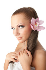 Fototapeta premium Beautiful woman with a flower