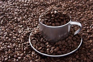 Xicara com grãos de café