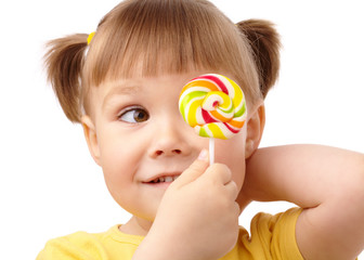 Little girl with lollipop