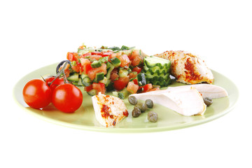 grilled chicken drumstick chunks on green
