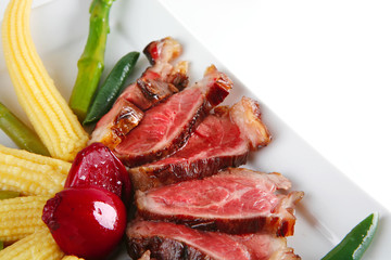 roasted beef served with corns