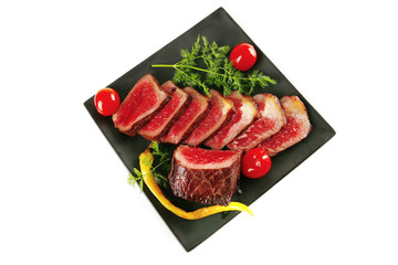 sliced fresh meat on dark