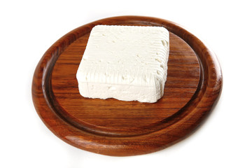 Fototapeta na wymiar miękki ser na talerzu