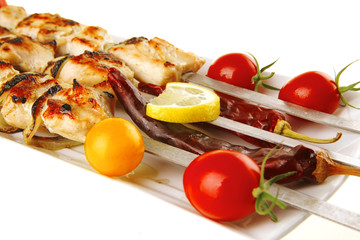 roast shish kebab on white