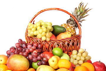 Naklejka na ściany i meble Group of colour fruit in basket. Isolated.