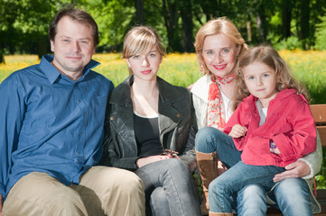 Happy family outdoor portrait