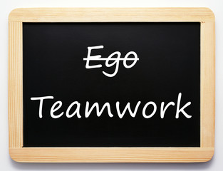 Obraz premium Teamwork und Ego Schild