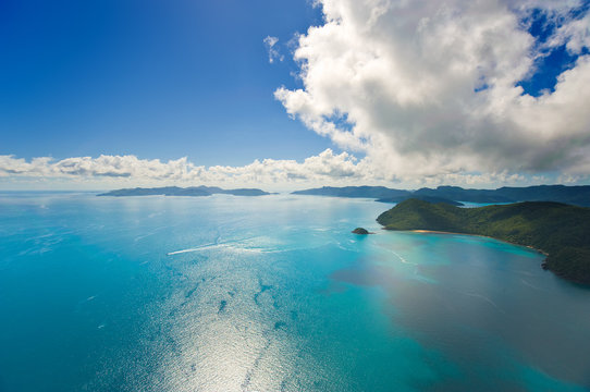 Aerial view of the Whitsunday Islands and brilliant ocean
