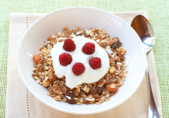 Healthy breakfast with muesli and yoghurt
